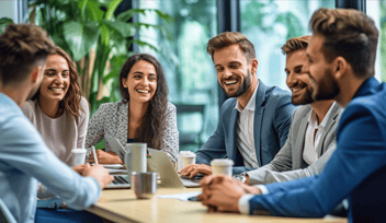 Team members give each other feedback during meeting.