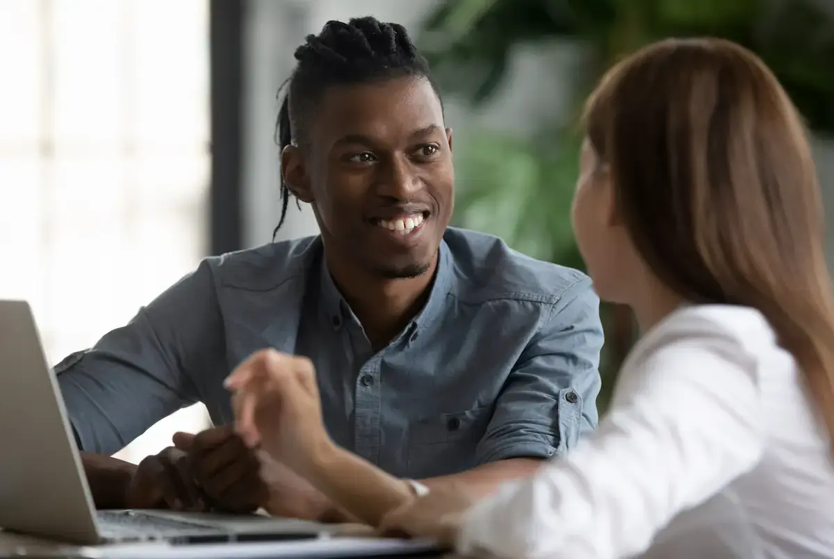 2 persons having a performance review